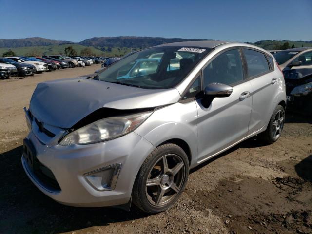 FORD FIESTA SES 2011 with VIN 3FADP4FJ6BM106950 - Photo from auction
