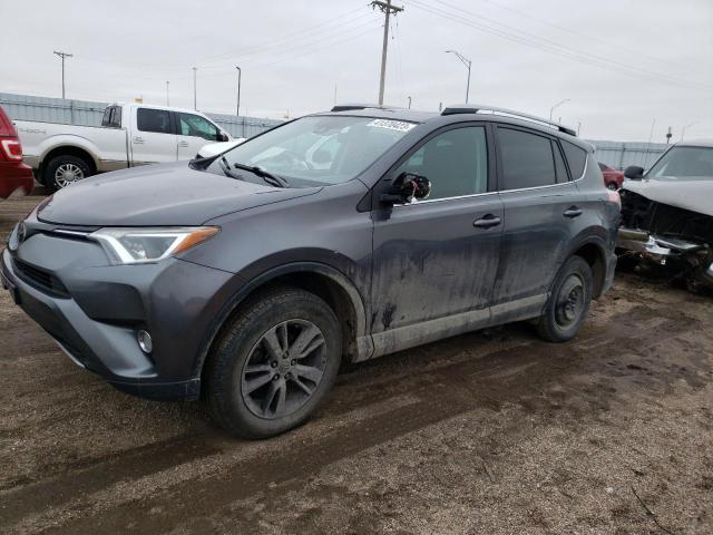 TOYOTA RAV4 XLE 2017 with VIN 2T3RFREV5HW590007 - Photo from auction