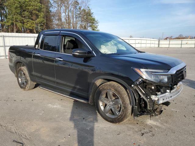 Photo 4 from auction – 2022 HONDA RIDGELINE with VIN 5FPYK3F71NB008983