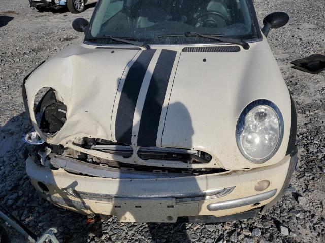 Photo 11 from auction – 2004 MINI COOPER with VIN WMWRC33444TJ57529