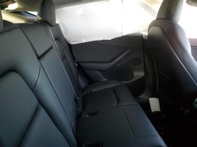 Photo 11 from auction – 2021 TESLA MODEL Y with VIN 5YJYGDEE0MF274879