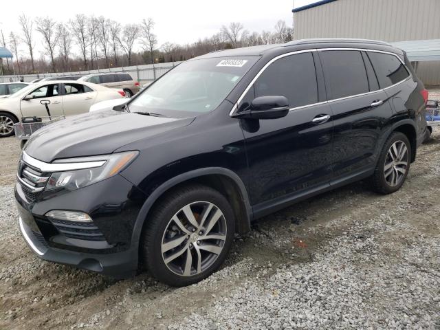 HONDA PILOT ELIT 2017 with VIN 5FNYF6H09HB077326 - Photo from auction