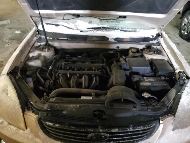 Photo 11 from auction – 2006 KIA OPTIMA LX with VIN KNAGE123865040302