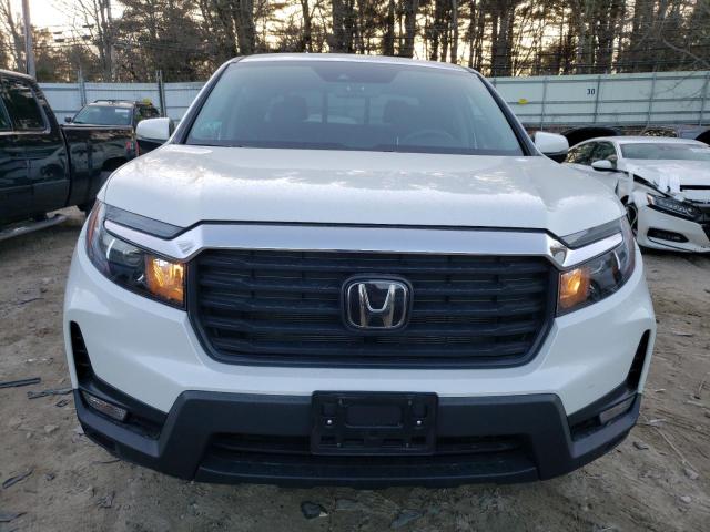Photo 5 from auction – 2022 HONDA RIDGELINE with VIN 5FPYK3F58NB022233