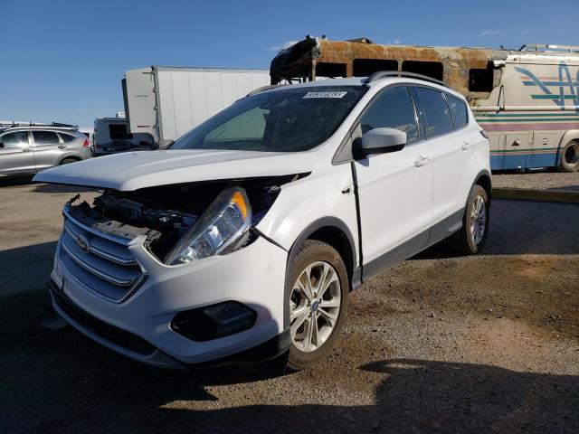 FORD ESCAPE SE 2018 with VIN 1FMCU9GD8JUC49621 - Photo from auction