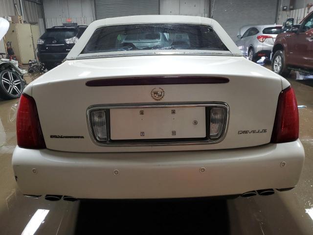 Photo 6 from auction – 2003 CADILLAC DEVILLE with VIN 1G6KD54Y53U244236