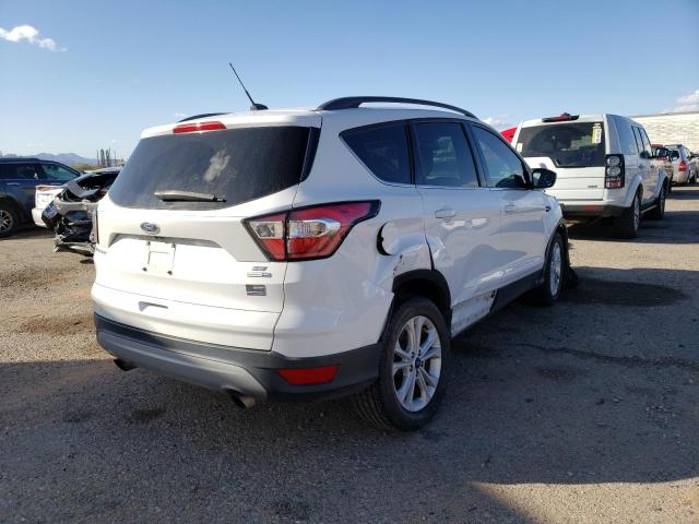 Photo 3 from auction – 2018 FORD ESCAPE SE with VIN 1FMCU9GD8JUC49621