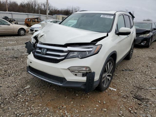 HONDA PILOT TOUR 2017 with VIN 5FNYF5H95HB025149 - Photo from auction
