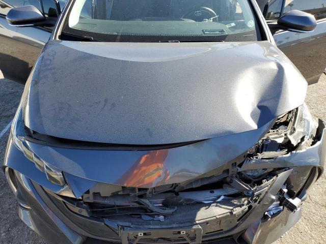 Photo 11 from auction – 2021 TOYOTA PRIUS PRIM with VIN JTDKAMFP3M3176711