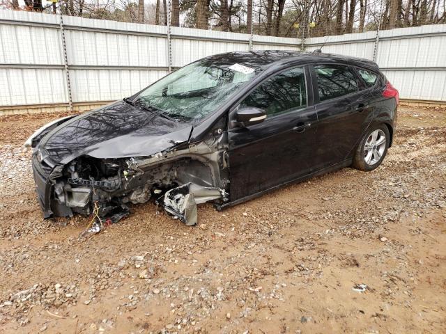FORD FOCUS SE 2014 with VIN 1FADP3K27EL409525 - Photo from auction