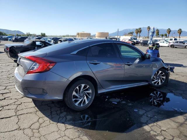 Photo 3 from auction – 2018 HONDA CIVIC EX with VIN 2HGFC2F71JH524998