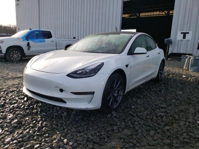 TESLA MODEL 3 2021 with VIN 5YJ3E1EBXMF044710 - Photo from auction