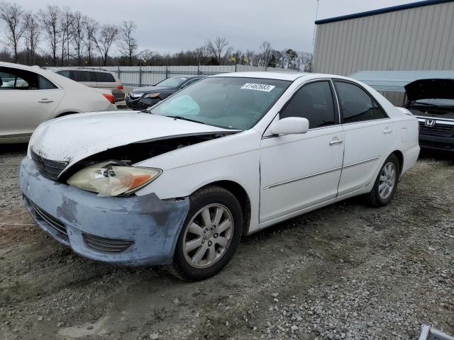 TOYOTA CAMRY LE 2003 with VIN 4T1BF32K13U058389 - Photo from auction