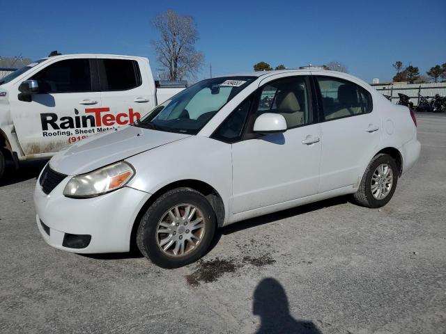 SUZUKI SX4 LE 2013 with VIN JS2YC5A39D6101546 - Photo from auction