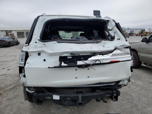 Photo 6 from auction – 2021 LINCOLN NAVIGATOR with VIN 5LMJJ2LT8MEL18890
