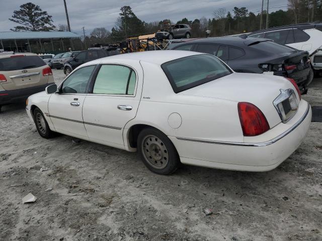 Photo 2 from auction – 2000 LINCOLN TOWN CAR E with VIN 1LNHM81W8YY896260