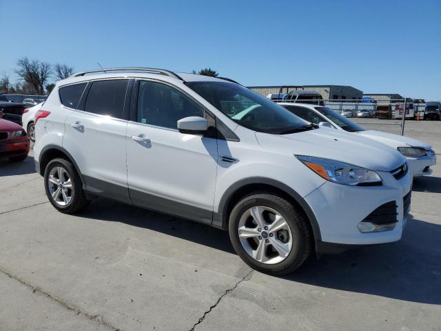 Photo 4 from auction – 2016 FORD ESCAPE SE with VIN 1FMCU9G96GUC63361