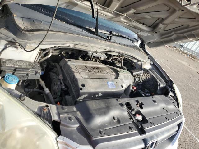 Photo 12 from auction – 2004 HONDA PILOT with VIN 2HKYF184X4H511268