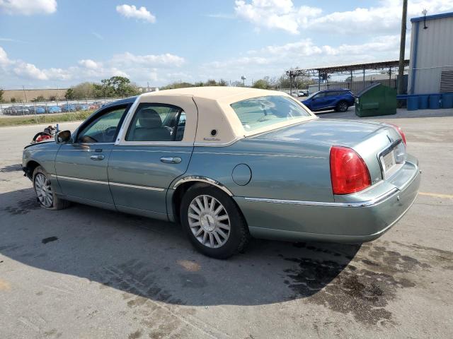 Photo 2 from auction – 2004 LINCOLN TOWN CAR E with VIN 1LNHM81W94Y613942