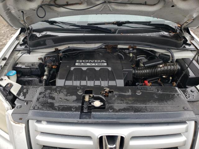 Photo 12 from auction – 2007 HONDA PILOT LX with VIN 2HKYF18117H538725