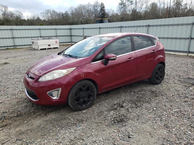 FORD FIESTA SES 2011 with VIN 3FADP4FJ2BM170760 - Photo from auction