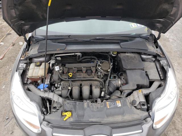 Photo 11 from auction – 2014 FORD FOCUS SE with VIN 1FADP3K27EL402512