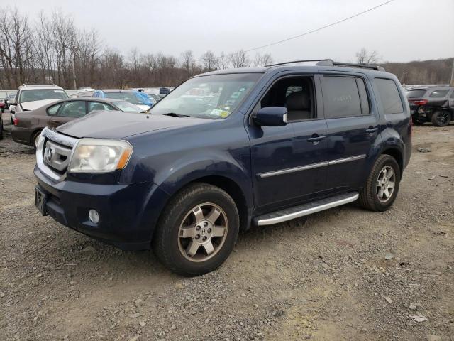 HONDA PILOT TOUR 2011 with VIN 5FNYF4H92BB041004 - Photo from auction