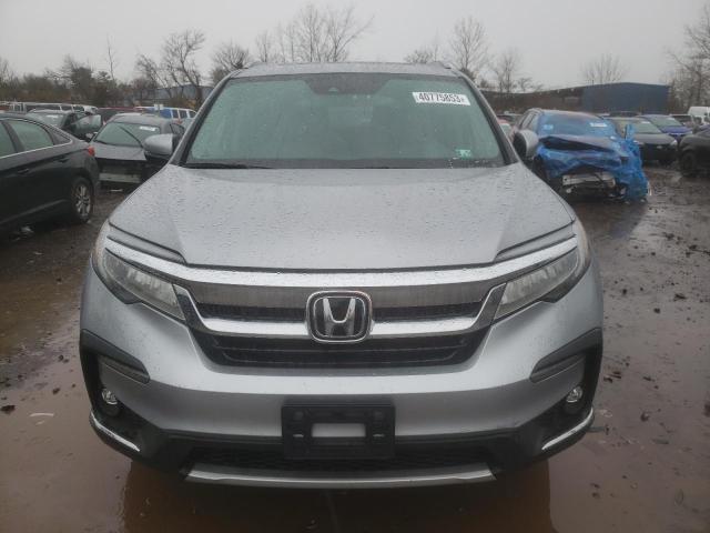 Photo 5 from auction – 2021 HONDA PILOT TOUR with VIN 5FNYF6H91MB076129