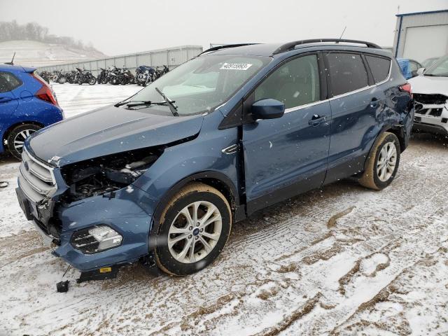 FORD ESCAPE SE 2018 with VIN 1FMCU9GD7JUC28694 - Photo from auction