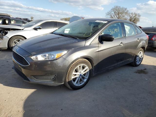 FORD FOCUS SE 2018 with VIN 1FADP3F29JL242332 - Photo from auction