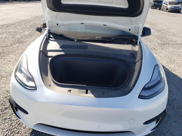 Photo 11 from auction – 2021 TESLA MODEL Y with VIN 5YJYGDED2MF110458