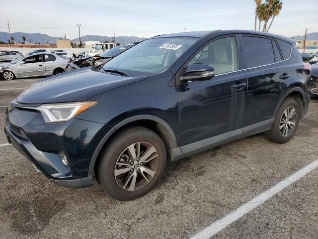 TOYOTA RAV4 XLE 2017 with VIN JTMWFREV7HD108234 - Photo from auction