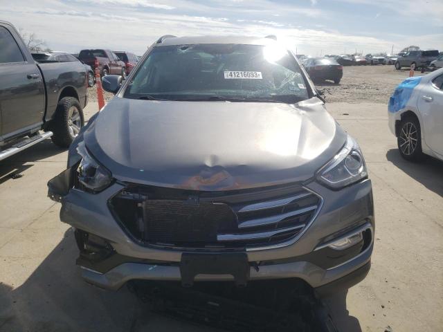 Photo 5 from auction – 2018 HYUNDAI SANTA FE S with VIN 5NMZU3LB1JH098113