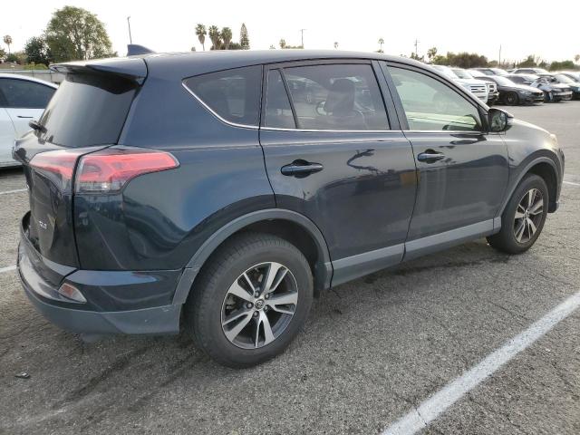 Photo 3 from auction – 2017 TOYOTA RAV4 XLE with VIN JTMWFREV7HD108234