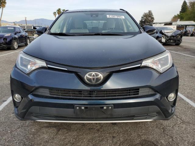 Photo 5 from auction – 2017 TOYOTA RAV4 XLE with VIN JTMWFREV7HD108234