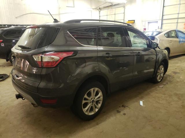 Photo 3 from auction – 2018 FORD ESCAPE SE with VIN 1FMCU9GD9JUB13661