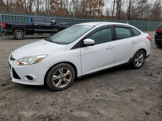 FORD FOCUS SE 2014 with VIN 1FADP3F21EL121221 - Photo from auction