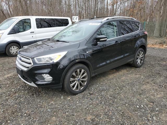 FORD ESCAPE TIT 2018 with VIN 1FMCU9J93JUC94079 - Photo from auction
