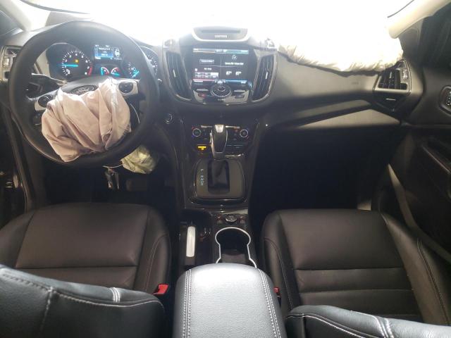 Photo 8 from auction – 2015 FORD ESCAPE TIT with VIN 1FMCU9J93FUB07494