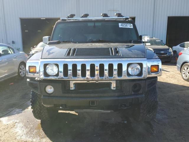 Photo 5 from auction – 2003 HUMMER H2 with VIN 5GRGN23U43H126568