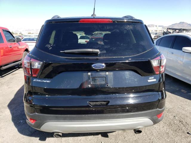 Photo 6 from auction – 2018 FORD ESCAPE SE with VIN 1FMCU0GD7JUC40629