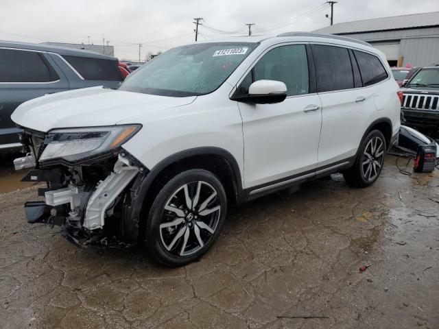 HONDA PILOT TOUR 2021 with VIN 5FNYF6H66MB023058 - Photo from auction