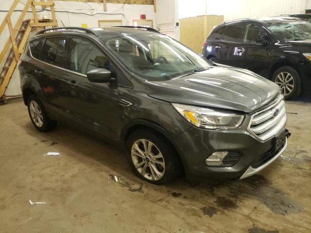 Photo 4 from auction – 2018 FORD ESCAPE SE with VIN 1FMCU9GD9JUB13661