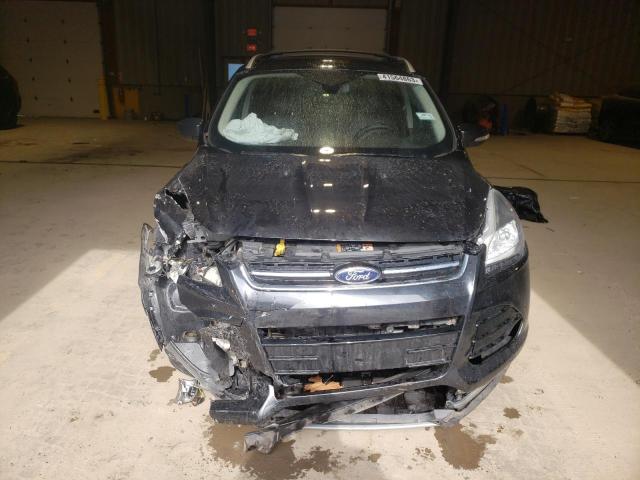 Photo 5 from auction – 2015 FORD ESCAPE TIT with VIN 1FMCU9J93FUB07494
