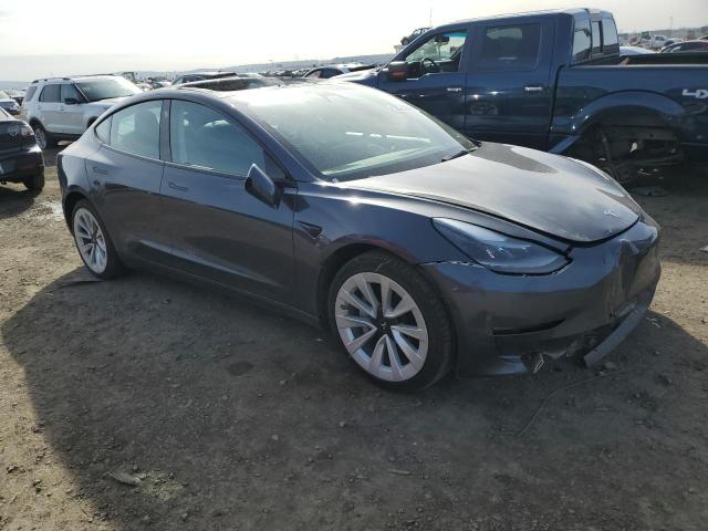 Photo 4 from auction – 2022 TESLA MODEL 3 with VIN 5YJ3E1EA8NF142725