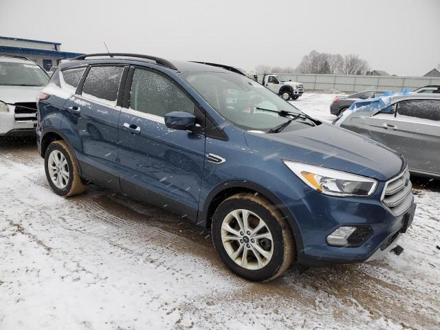 Photo 4 from auction – 2018 FORD ESCAPE SE with VIN 1FMCU9GD7JUC28694