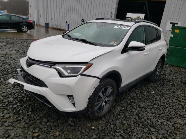Photo 1 from auction – 2017 TOYOTA RAV4 XLE with VIN 2T3RFREV0HW568108