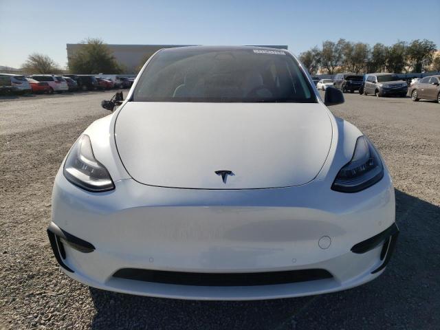 Photo 5 from auction – 2021 TESLA MODEL Y with VIN 5YJYGDED2MF110458