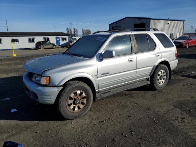 HONDA PASSPORT E 1999 with VIN 4S6CM58W6X4423470 - Photo from auction
