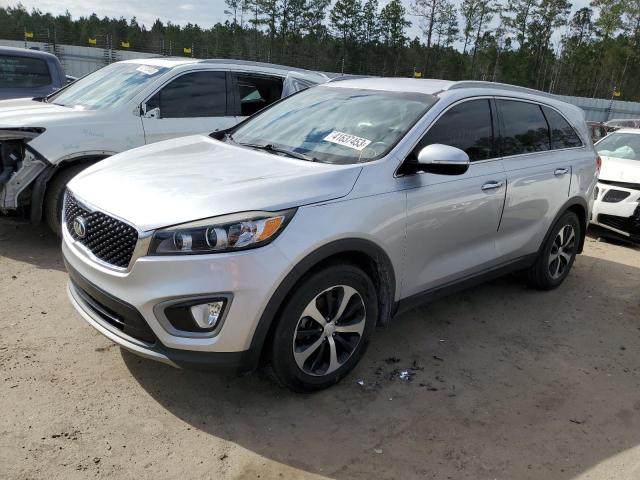 KIA SORENTO EX 2016 with VIN 5XYPH4A12GG021605 - Photo from auction
